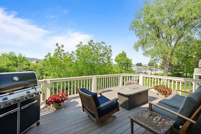 102 Abbey Ridge Ct Unit 102, Fontana, WI 53125 - wooden deck with a grill, an outdoor living space, and a water view