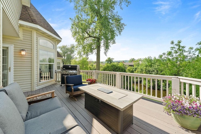 102 Abbey Ridge Ct Unit 102, Fontana, WI 53125 - wooden terrace with an outdoor hangout area and area for grilling