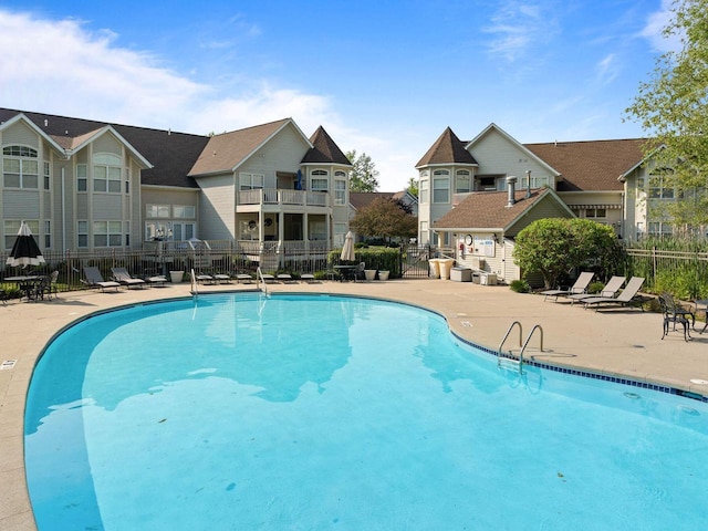 102 Abbey Ridge Ct Unit 102, Fontana, WI 53125 - community pool featuring a patio area
