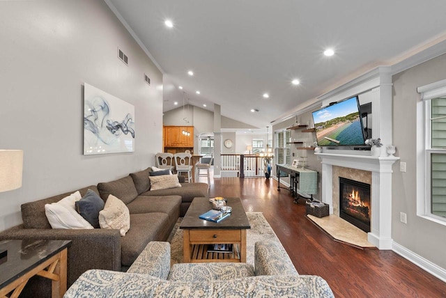 102 Abbey Ridge Ct Unit 102, Fontana, WI 53125 - living room with recessed lighting, dark wood-type flooring, a high end fireplace, lofted ceiling, and crown molding