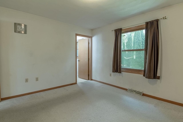 119 N 12th Ave, Monroe, WI 53566 - unfurnished room featuring light colored carpet