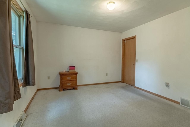 119 N 12th Ave, Monroe, WI 53566 - unfurnished room with baseboards