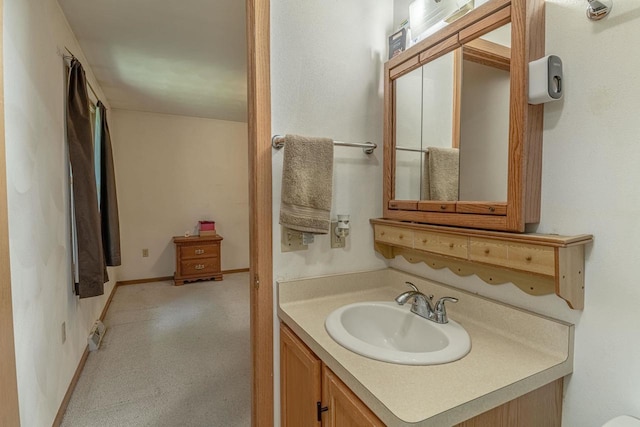 119 N 12th Ave, Monroe, WI 53566 - bathroom featuring vanity and baseboards