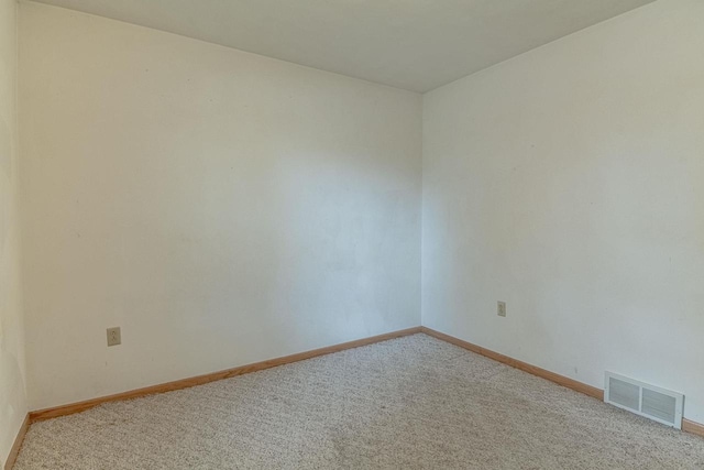 119 N 12th Ave, Monroe, WI 53566 - unfurnished room with light carpet
