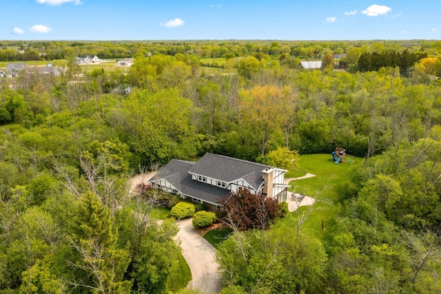 8650 N River Rd, River Hills, WI 53217 - view of subject property with a heavily wooded area