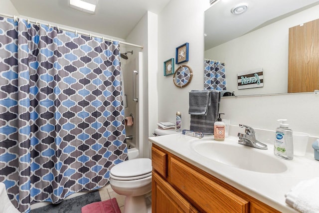 1390 21st St, Hazel Green, WI 53811 - bathroom with vanity, toilet, tile patterned flooring, and shower / bathtub combination with curtain