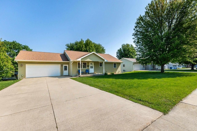 1390 21st St, Hazel Green, WI 53811 - ranch-style house featuring a porch, an attached garage, a front yard, and concrete driveway