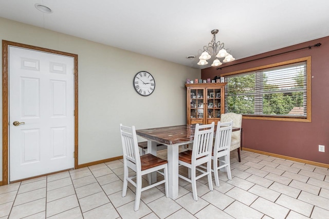 1390 21st St, Hazel Green, WI 53811 - dining room with a chandelier, baseboards, and light tile patterned flooring