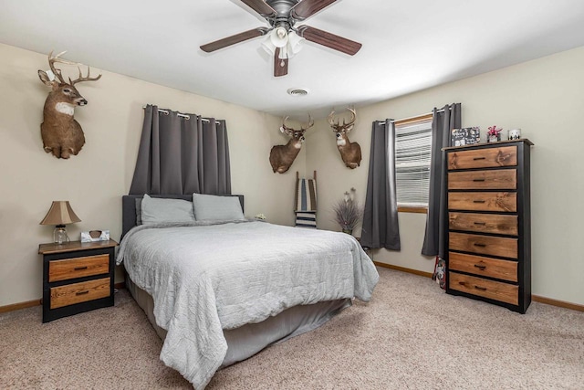 1390 21st St, Hazel Green, WI 53811 - bedroom featuring light colored carpet, baseboards, and a ceiling fan