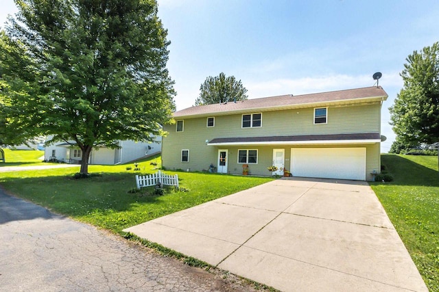 1390 21st St, Hazel Green, WI 53811 - view of front of house with a garage, a front lawn, and driveway