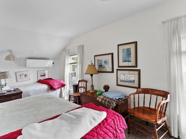 8090 State Highway 57, Baileys Harbor, WI 54202 - bedroom with vaulted ceiling and an AC wall unit