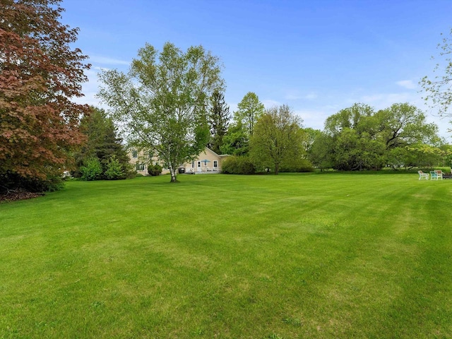 8090 State Highway 57, Baileys Harbor, WI 54202 - view of grassy yard with view of scattered trees