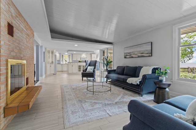 4080 Windermere Ln, Oshkosh, WI 54902 - living room featuring baseboards and a brick fireplace