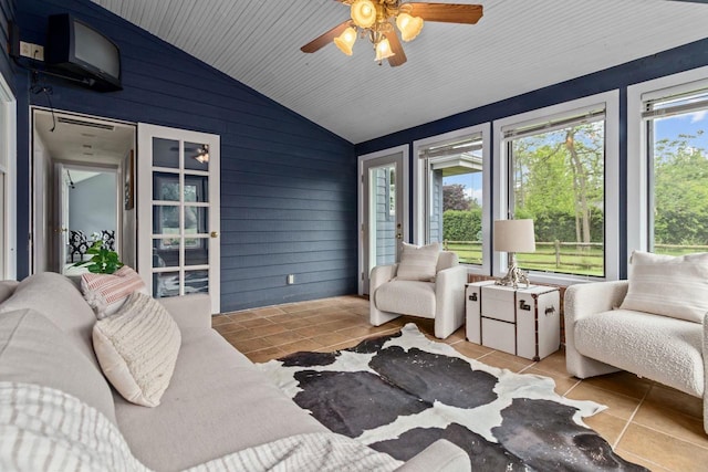 4080 Windermere Ln, Oshkosh, WI 54902 - sunroom / solarium featuring lofted ceiling, tile patterned floors, and wooden walls
