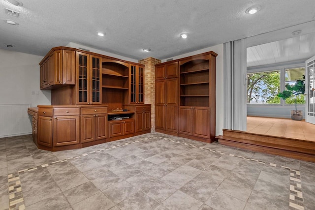 4080 Windermere Ln, Oshkosh, WI 54902 - unfurnished living room featuring a textured ceiling