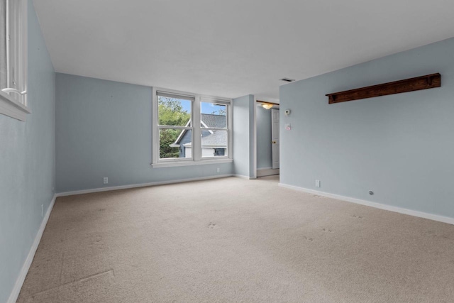 4080 Windermere Ln, Oshkosh, WI 54902 - spare room featuring carpet floors and baseboards