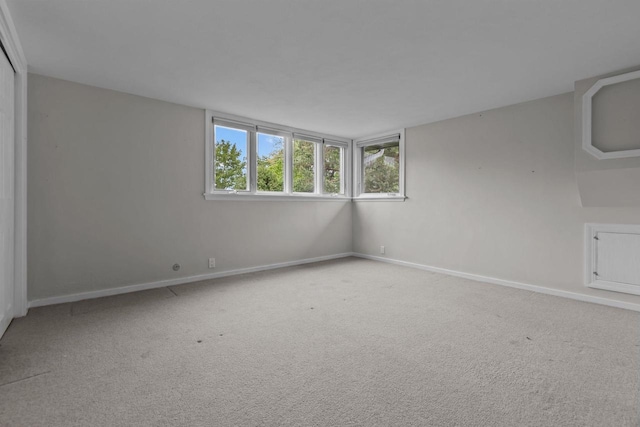 4080 Windermere Ln, Oshkosh, WI 54902 - spare room featuring baseboards and carpet floors