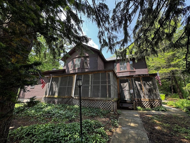 432 W Capitol Dr, Hartland, WI 53029 - back of property featuring a sunroom