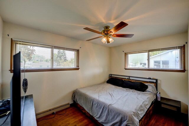 1516 Pierce Ave, Oshkosh, WI 54902 - bedroom with multiple windows, wood finished floors, and ceiling fan