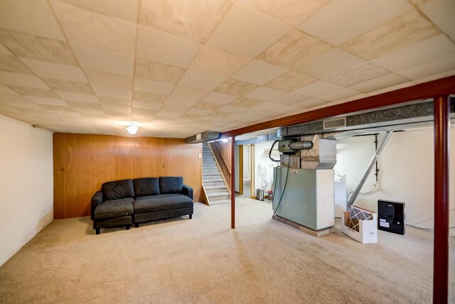1516 Pierce Ave, Oshkosh, WI 54902 - finished basement featuring carpet flooring, stairs, and wood walls