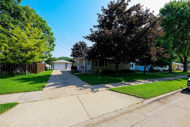 1516 Pierce Ave, Oshkosh, WI 54902 - view of front facade featuring a garage, an outbuilding, and stone siding