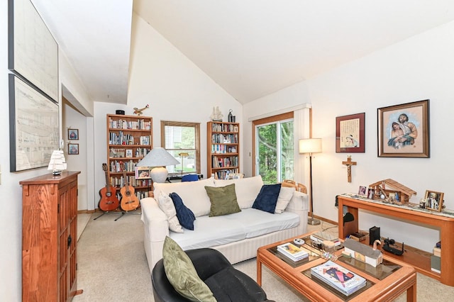 2016 Madera St Unit 2018, Waukesha, WI 53189 - living area with light carpet, baseboards, and high vaulted ceiling