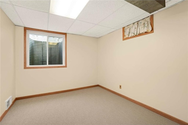 1711 Olive St, Stillwater, MN 55082 - empty room featuring carpet flooring, a drop ceiling, and baseboards