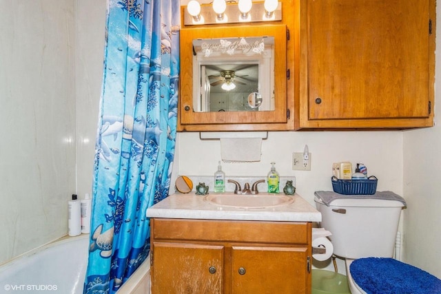 314 E Maple Ave, Beaver Dam, WI 53916 - full bath with vanity, toilet, shower / bathtub combination with curtain, and ceiling fan