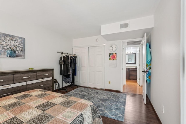2350 Good Hope Rd Unit 156, Glendale, WI 53209 - bedroom featuring wood finished floors, a closet, and baseboards