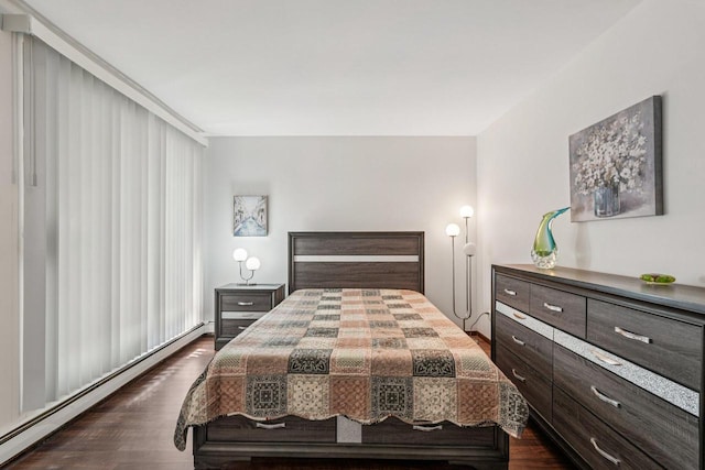 2350 Good Hope Rd Unit 156, Glendale, WI 53209 - bedroom featuring baseboard heating and dark wood finished floors