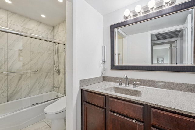 2350 Good Hope Rd Unit 156, Glendale, WI 53209 - bathroom with vanity, toilet, bath / shower combo with glass door, and recessed lighting