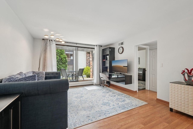 2350 Good Hope Rd Unit 156, Glendale, WI 53209 - living area featuring wood finished floors and baseboards