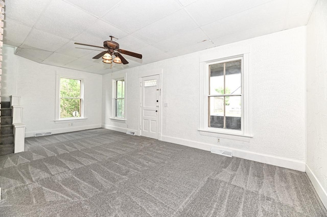 1443 Summit Ave, Racine, WI 53404 - unfurnished living room with a drop ceiling, carpet flooring, and ceiling fan