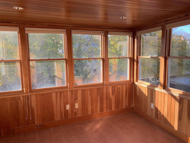 2723 N Downer Ave Unit 2725, 2725A, Milwaukee, WI 53211 - unfurnished sunroom with carpet flooring, wood walls, and wooden ceiling