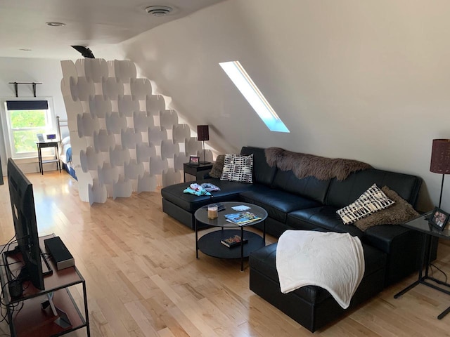 2723 N Downer Ave Unit 2725, 2725A, Milwaukee, WI 53211 - living area featuring a skylight and light wood-type flooring