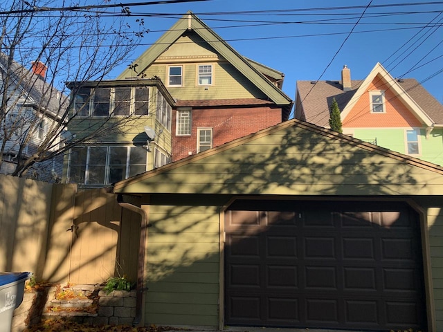 2723 N Downer Ave Unit 2725, 2725A, Milwaukee, WI 53211 - view of home's exterior with a sunroom