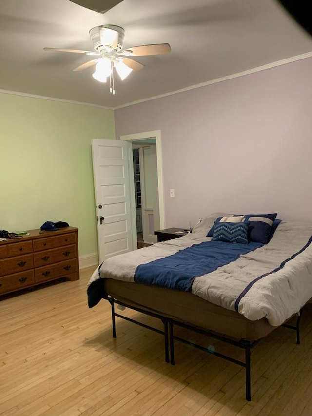 2723 N Downer Ave Unit 2725, 2725A, Milwaukee, WI 53211 - bedroom featuring crown molding, light wood-type flooring, and a ceiling fan