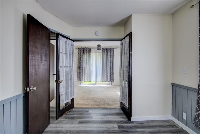 N211 County Road J, Hatfield, WI 54754 - entryway with wood finished floors and radiator heating unit