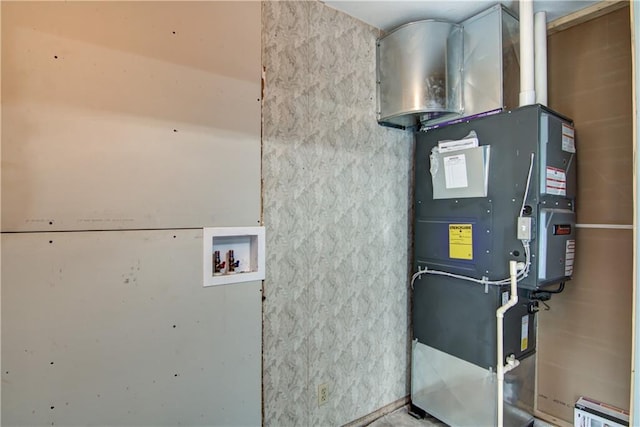N211 County Road J, Hatfield, WI 54754 - utility room with heating unit