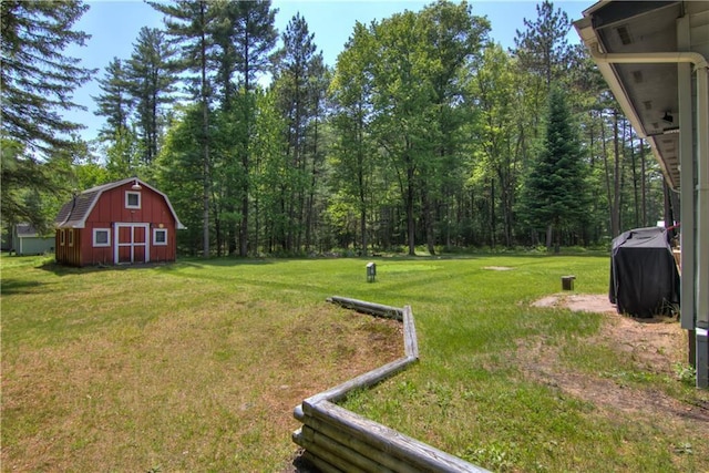 N211 County Road J, Hatfield, WI 54754 - view of grassy yard with an outbuilding and a barn