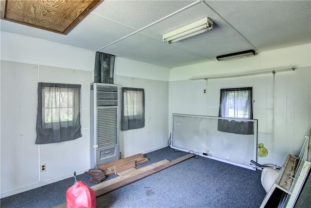 N211 County Road J, Hatfield, WI 54754 - interior space featuring carpet and wooden walls