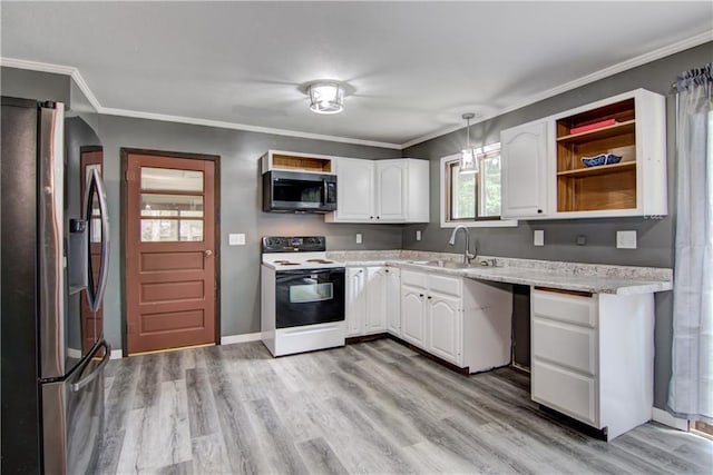 N211 County Road J, Hatfield, WI 54754 - kitchen with stainless steel appliances, a sink, white cabinets, light countertops, and crown molding