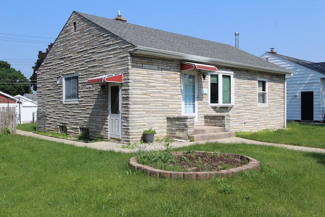 3253 S 68th St, Milwaukee, WI 53219 - view of front of house featuring stone siding, a front lawn, and a shingled roof