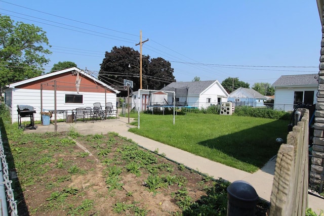 3253 S 68th St, Milwaukee, WI 53219 - view of yard with a trampoline and a patio area