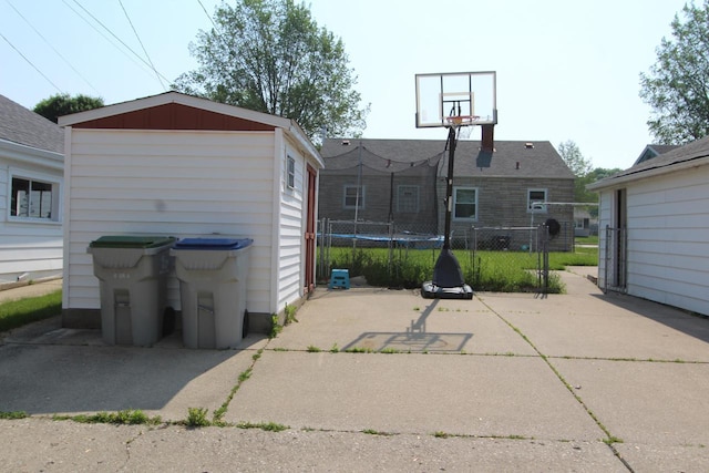 3253 S 68th St, Milwaukee, WI 53219 - view of patio / terrace with a trampoline and an outdoor structure