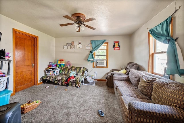 106 S Richmond Ave, Gillett, WI 54124 - living area featuring a ceiling fan, carpet floors, cooling unit, and baseboards