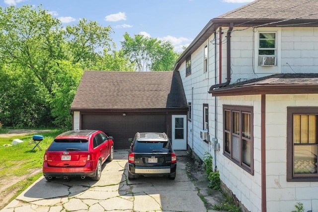 106 S Richmond Ave, Gillett, WI 54124 - view of property exterior featuring roof with shingles and concrete driveway