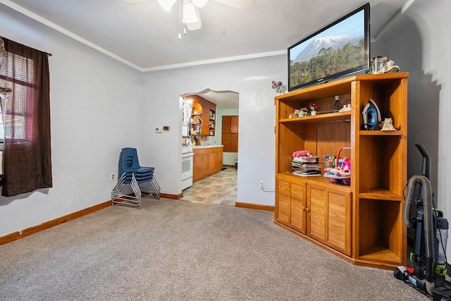106 S Richmond Ave, Gillett, WI 54124 - living area with light colored carpet, a ceiling fan, baseboards, and ornamental molding