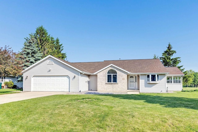 5073 Scottie Ct, New Franken, WI 54229 - ranch-style house with an attached garage, driveway, a front yard, and a shingled roof