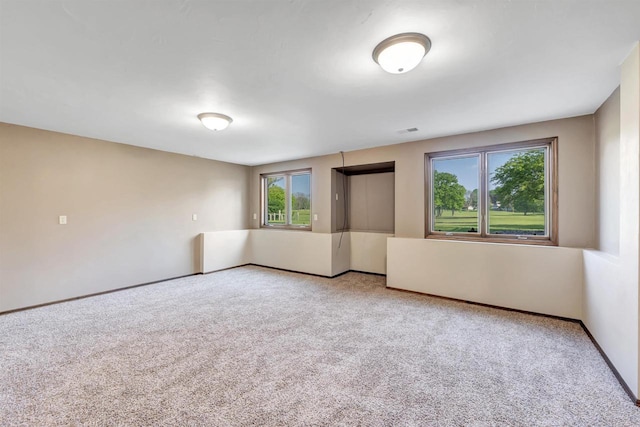 5073 Scottie Ct, New Franken, WI 54229 - unfurnished room featuring carpet and baseboards